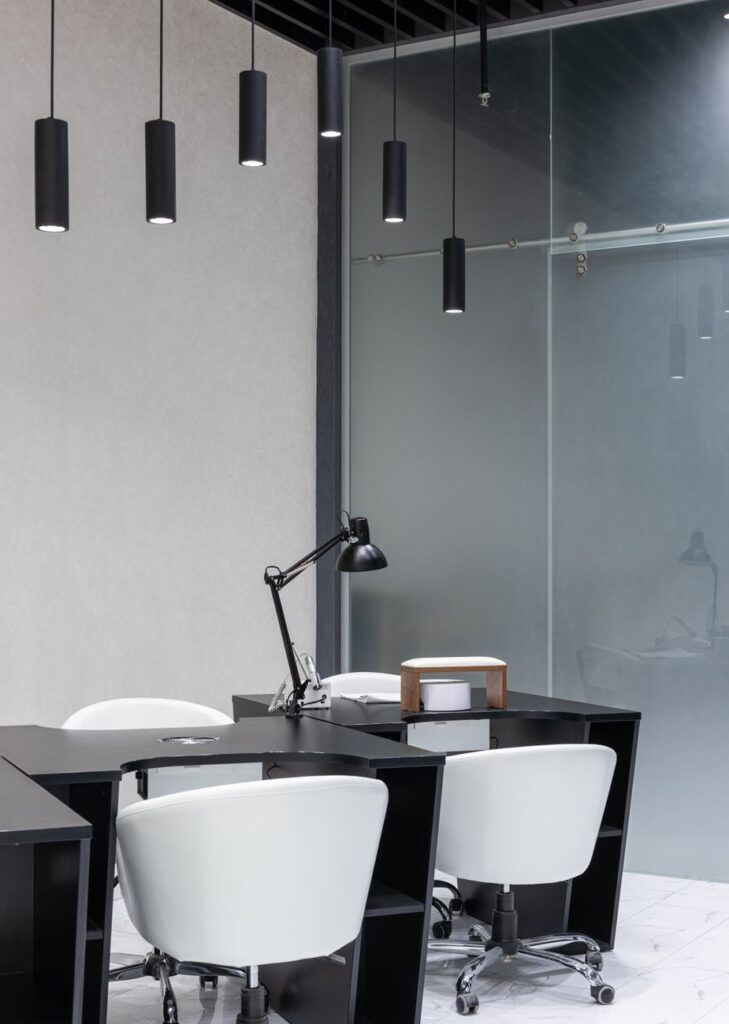 black and white furniture at manicure stations