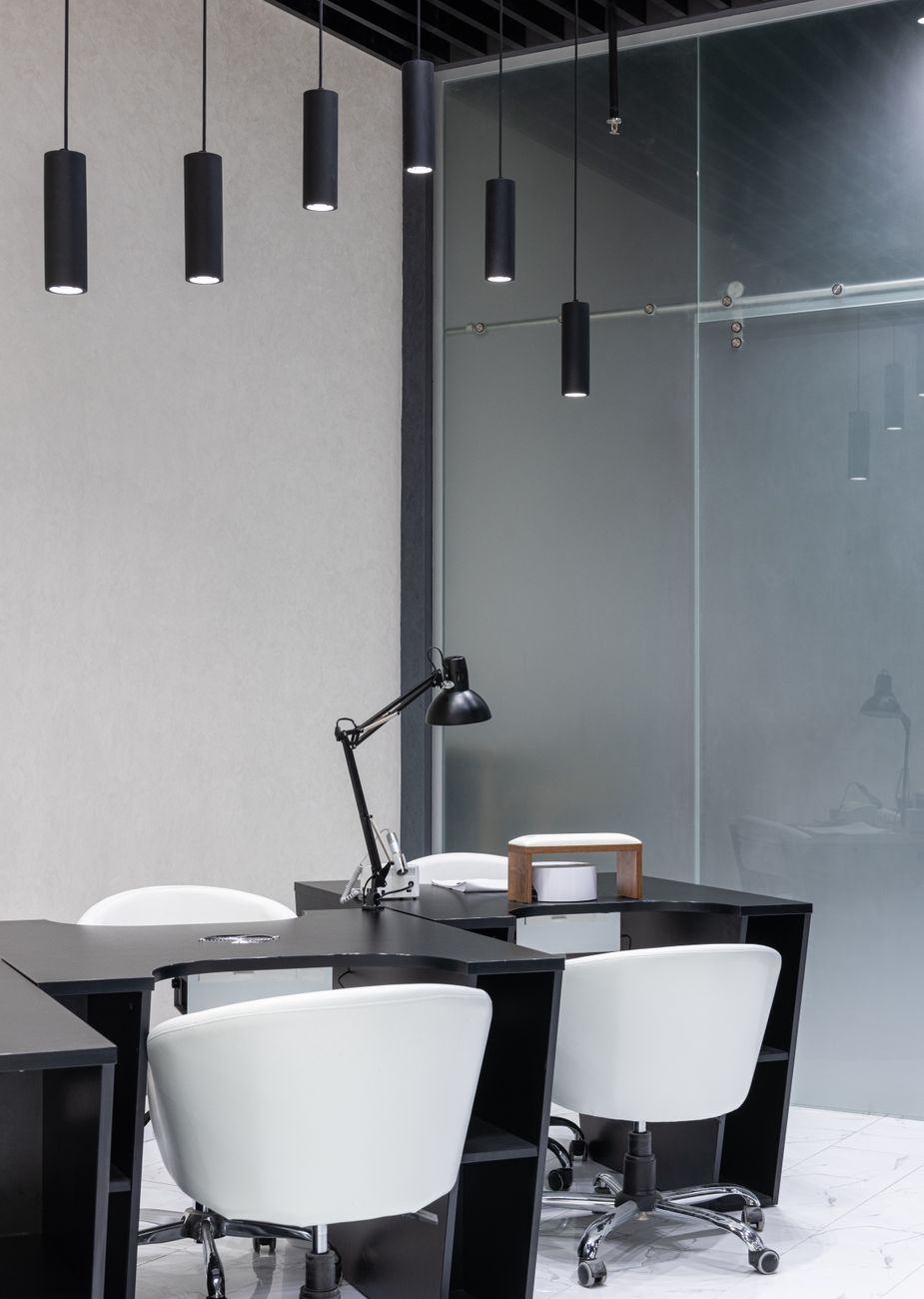 black and white furniture at manicure stations